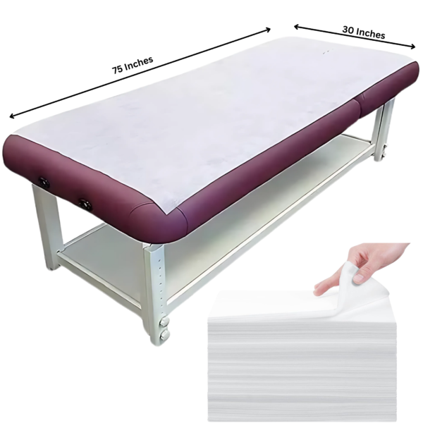 40 GSM white non-woven disposable medical couch sheet on a massage table with a stack of sheets