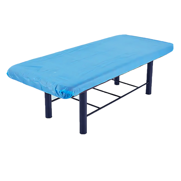 Non-woven disposable fitted couch sheet on medical examination couch for hygiene and protection.