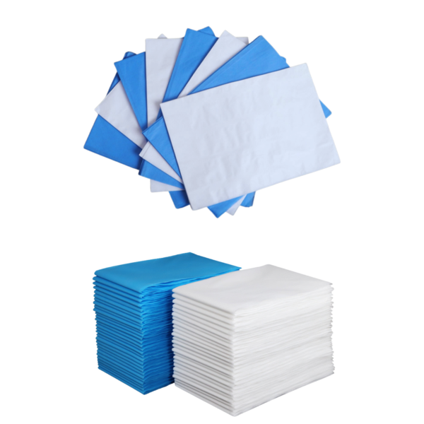 Stacks of 40 GSM white and blue non-woven disposable medical couch sheets with spread-out sheets.